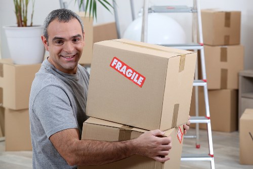 Removal van and packed boxes in Ealing street