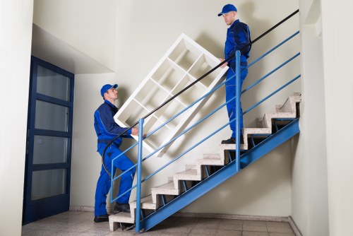 Moving household furniture into secure storage in West London