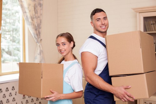 Professional movers handling furniture during a local move in Ealing